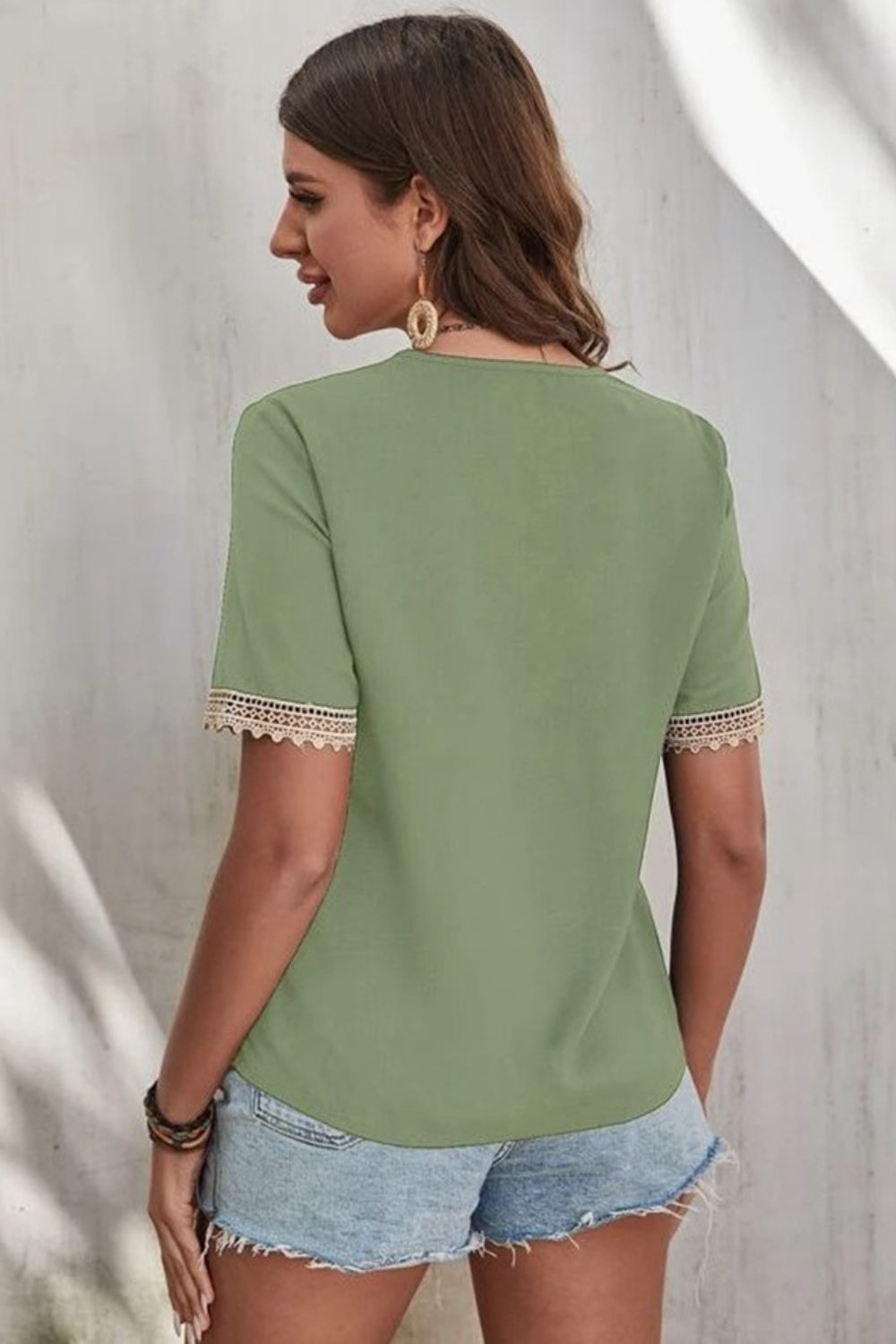 Casablanca Lace Elegance: V-Neck Short Sleeve Blouse