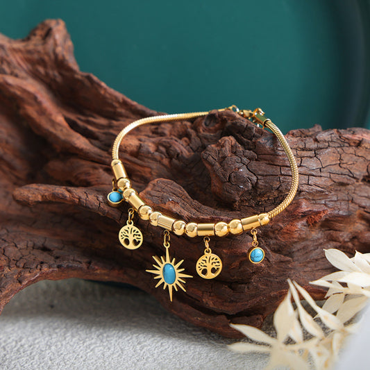 Mesopotamian Gleam: Gold-Plated Charm Bracelet