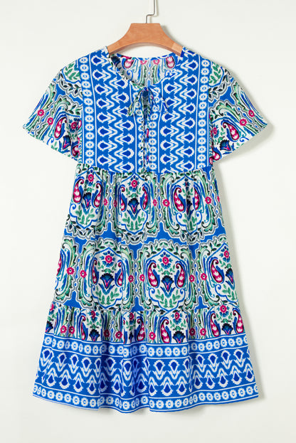 Saffron Breeze: Paisley Accent Tie Neck Ruffle Hem Short Dress