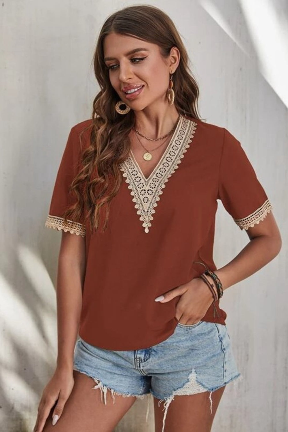 Casablanca Lace Elegance: V-Neck Short Sleeve Blouse