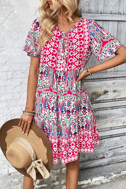 Saffron Breeze: Paisley Accent Tie Neck Ruffle Hem Short Dress