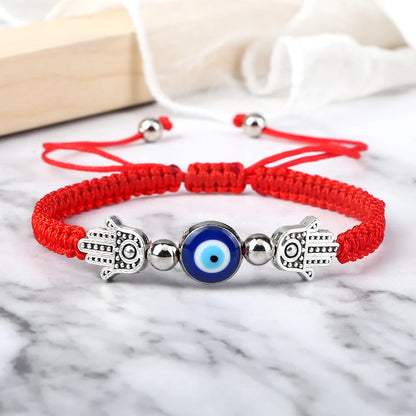 Envy's Gaze: Hamsa Pendant Bracelet