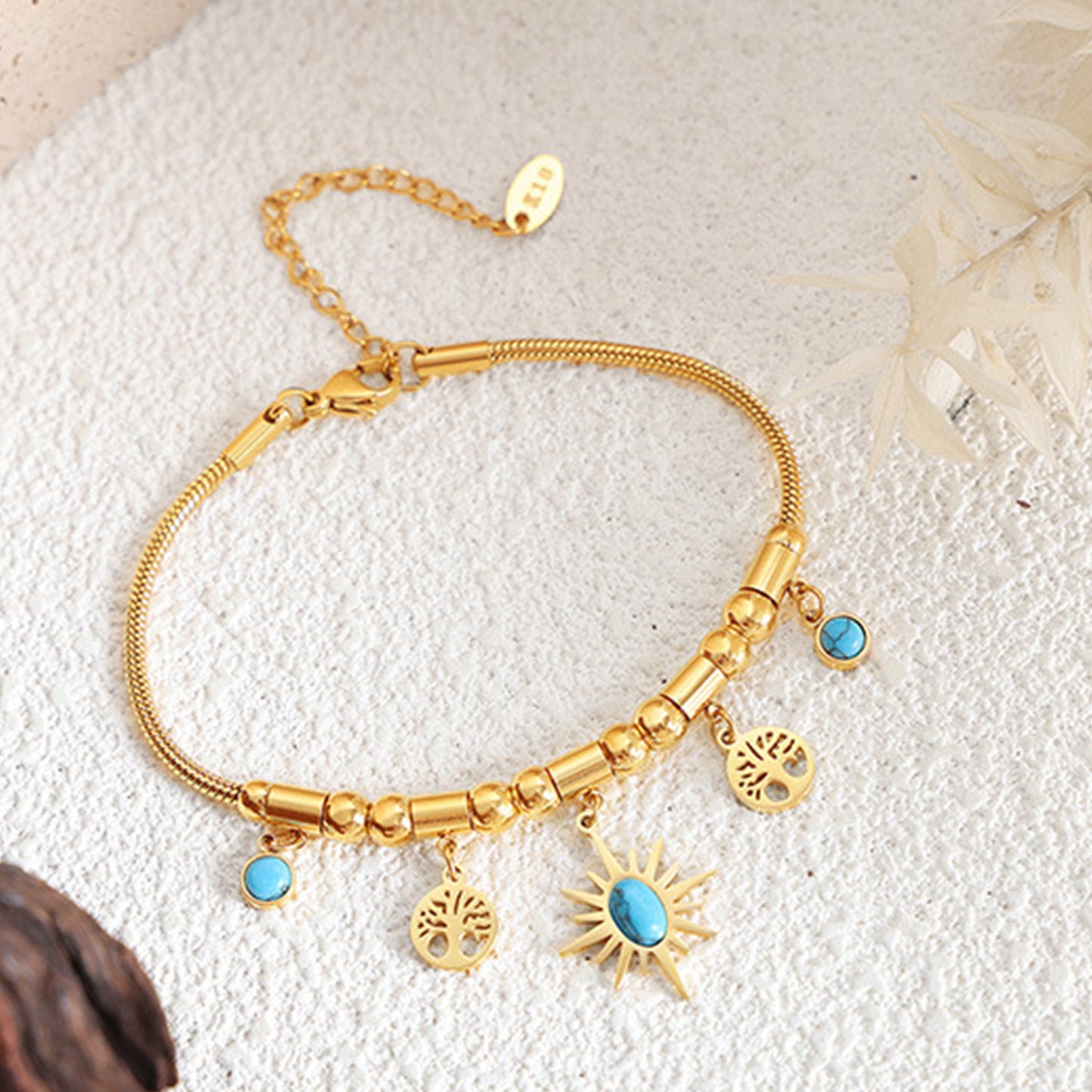 Mesopotamian Gleam: Gold-Plated Charm Bracelet