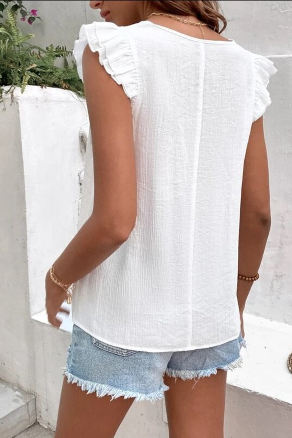 Casablanca Breeze: Ruffled V-Neck Cap Sleeve Blouse