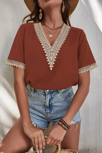 Casablanca Lace Elegance: V-Neck Short Sleeve Blouse